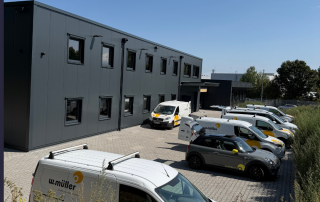 Firmenfahrzeuge der Winfried Müller GmbH am neuen Betriebsstandort in Andernach